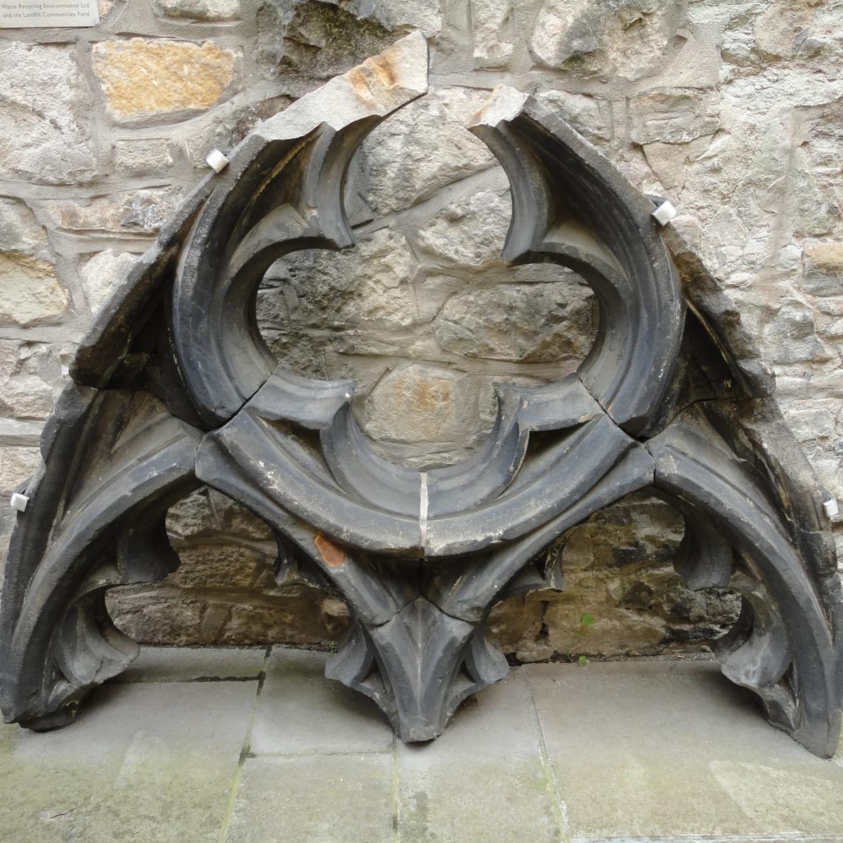 An image of medieval window tracery. Carved from stone it has been reconstructed out of broken fragments. An image of medieval window tracery. Carved from stone it has been reconstructed out of broken fragments.