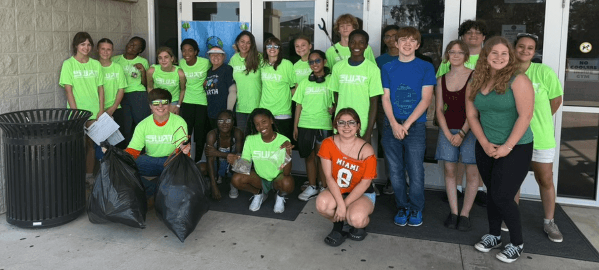 Alachua youth group photo after park clean-up event Alachua youth group photo after park clean-up event