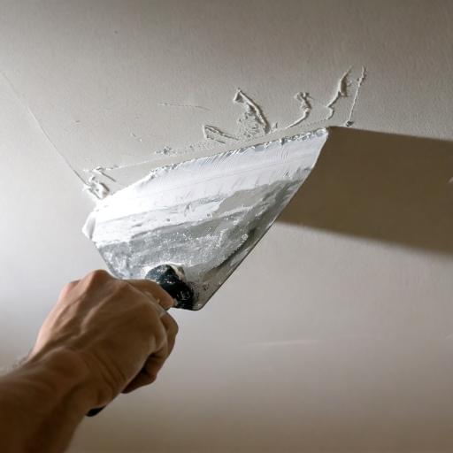 Applying plaster to a ceiling crack - expert drywall patching and repair in Reading, PA. Applying plaster to a ceiling crack - expert drywall patching and repair in Reading, PA.