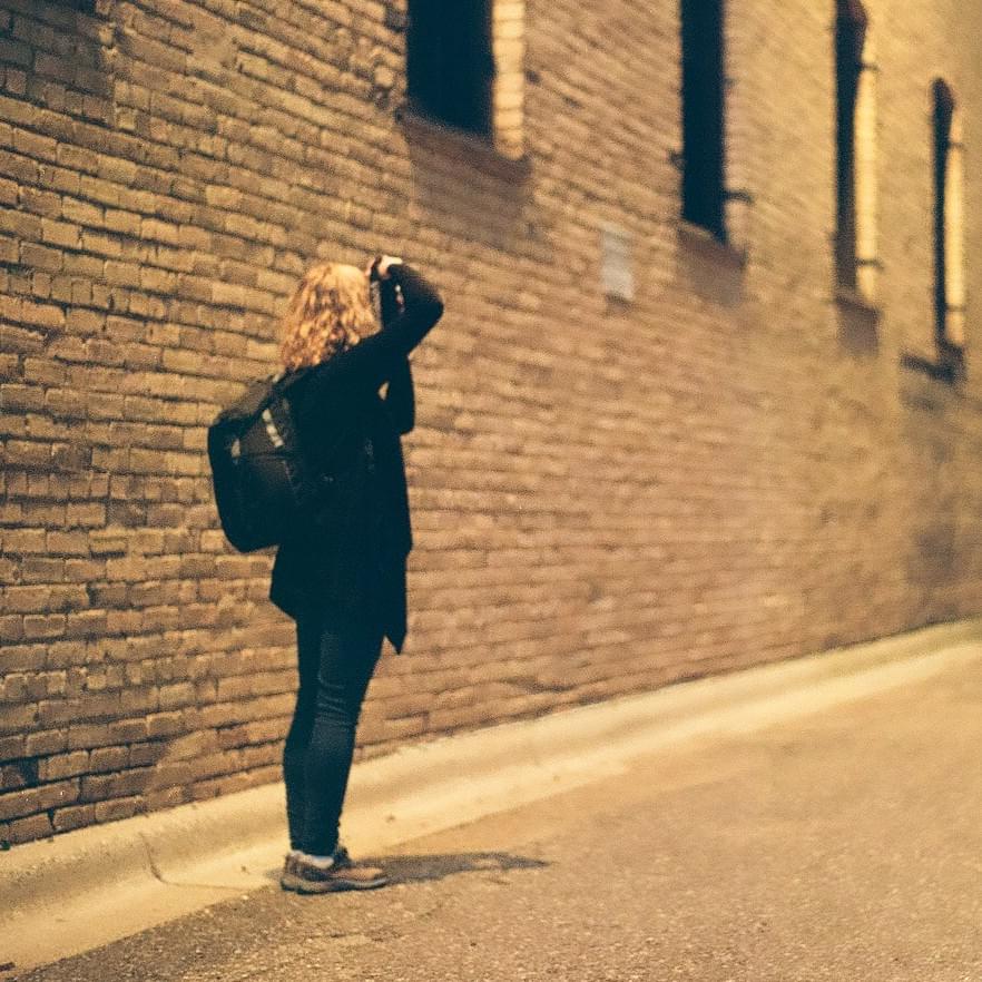 Photographer in laneway Photographer in laneway