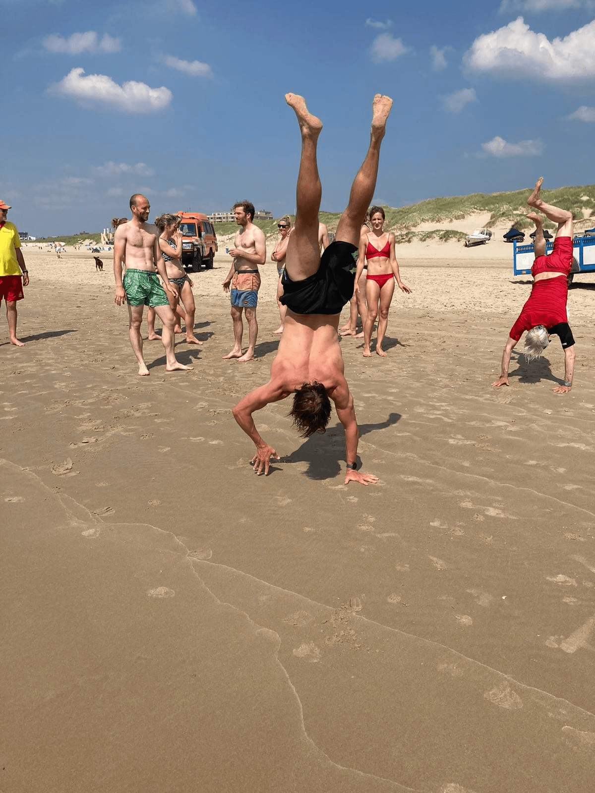 Kite Doctors attendees celebrating by the sea Kite Doctors attendees celebrating by the sea