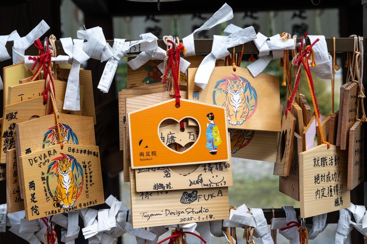 Photobooks By Women wooden prayer messages in a temple Photobooks By Women wooden prayer messages in a temple