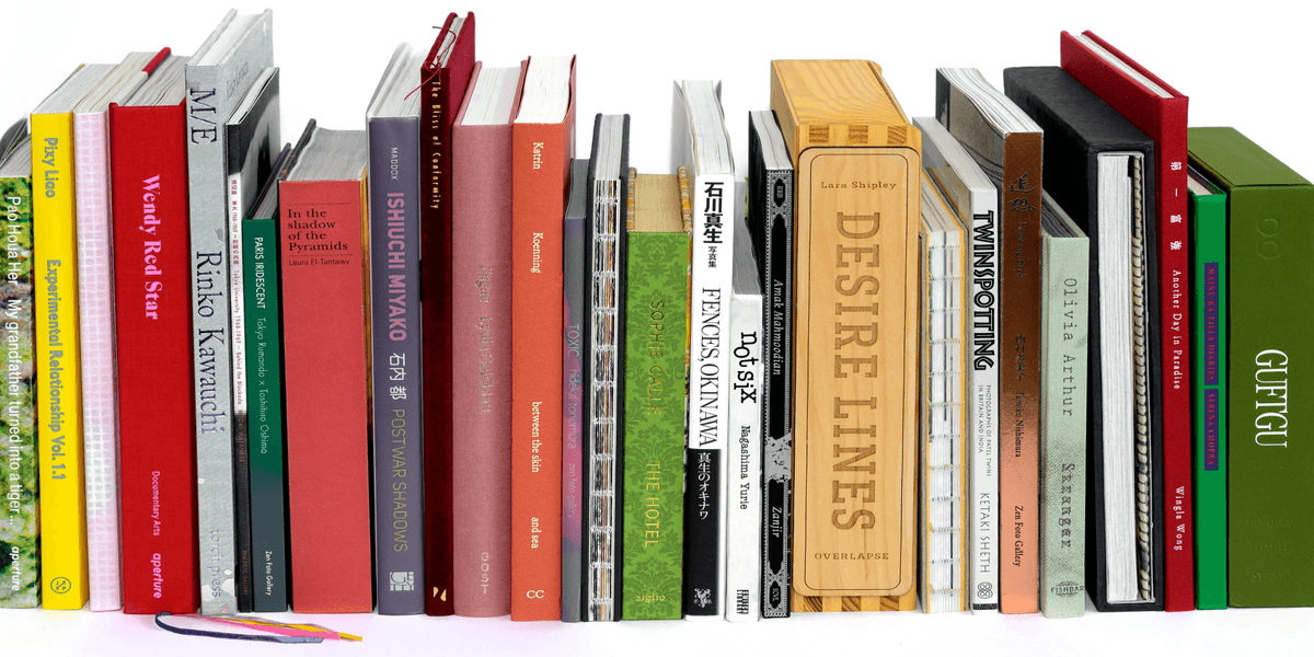 Photobooks By Women stack of Photobooks By Women Photobooks By Women stack of Photobooks By Women