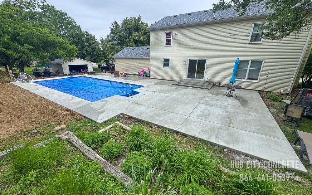 just completed concrete pool deck in backyard just completed concrete pool deck in backyard
