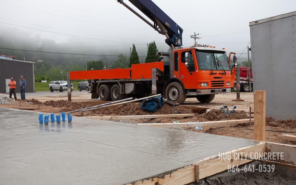 commercial concrete truck with boom pouring commercial slab commercial concrete truck with boom pouring commercial slab
