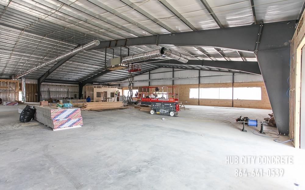 Commercial Concrete floor finished during new store construction Commercial Concrete floor finished during new store construction