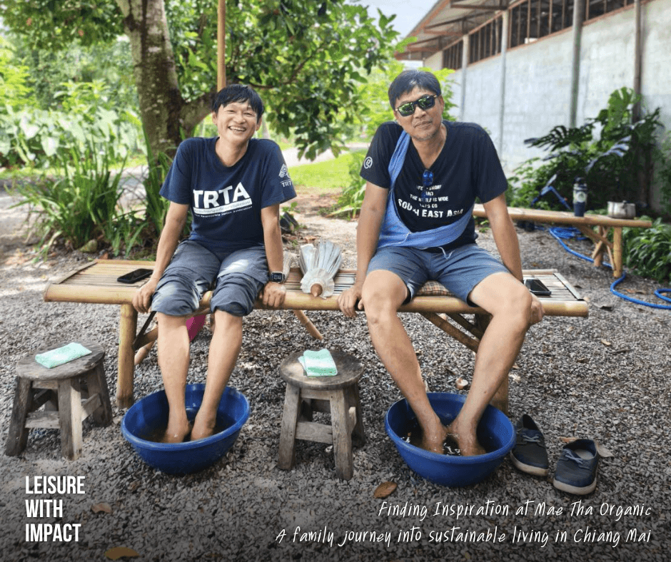 Visitors enjoy a traditional herbal foot soak at Mae Tha Organic, a relaxing wellness experience using locally grown medicinal herbs. Visitors enjoy a traditional herbal foot soak at Mae Tha Organic, a relaxing wellness experience using locally grown medicinal herbs.