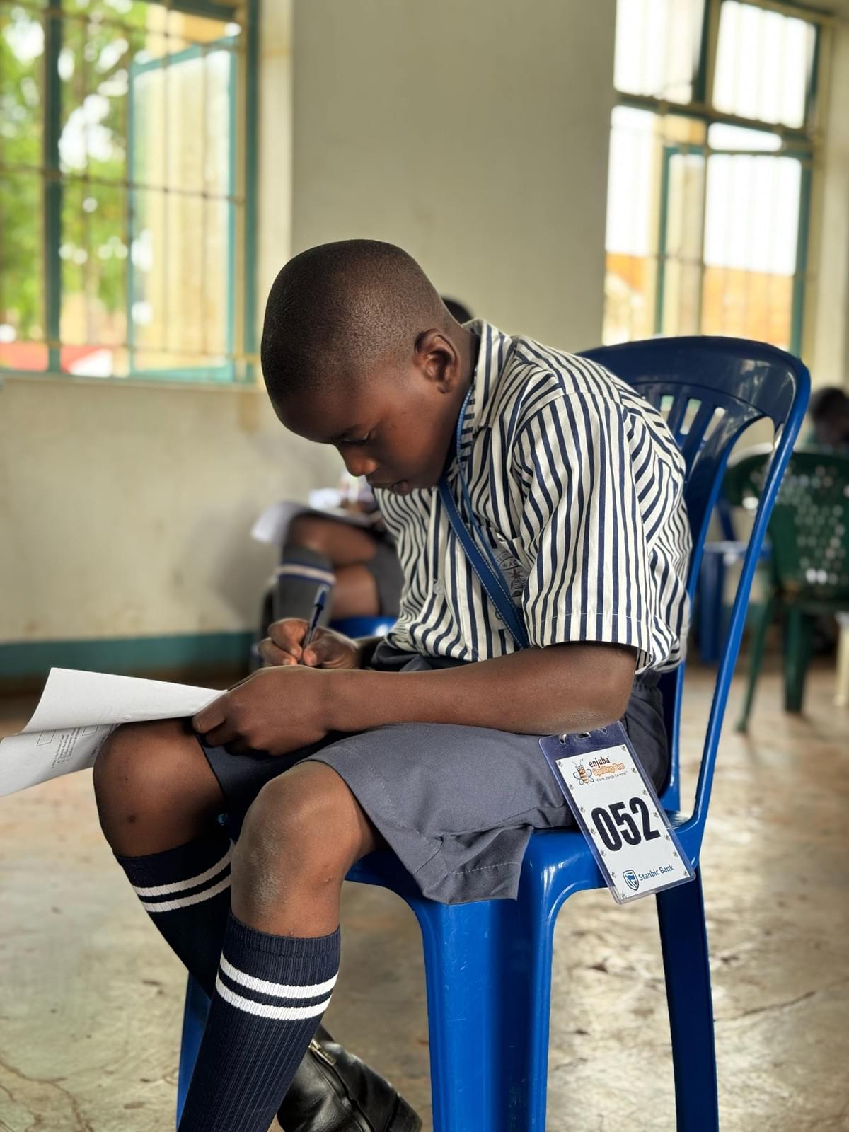 A speller taking the written test at the Tororo District spelling bee. A speller taking the written test at the Tororo District spelling bee.
