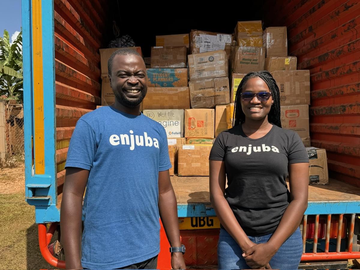Our Chief Literacy Officer, William Mukisa (in blue) upon receiving the books. Our Chief Literacy Officer, William Mukisa (in blue) upon receiving the books.