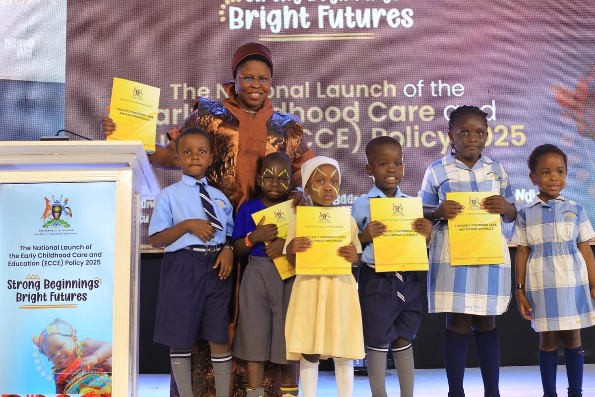 Hon. Joyce Moriku Kaducu, the Mnister of state for Education & Sports having a photo moment with children during the launch. Hon. Joyce Moriku Kaducu, the Mnister of state for Education & Sports having a photo moment with children during the launch.