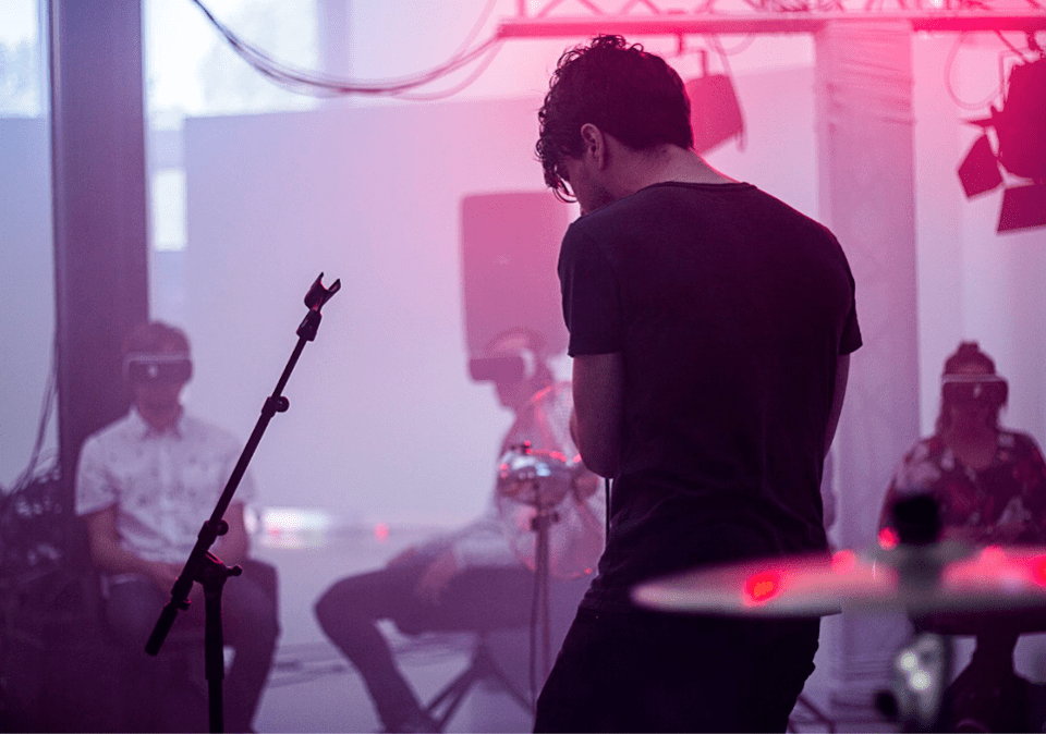 Miro Shot is much more than a band. Note the audience in VR headsets. MR Wash Miro Shot is much more than a band. Note the audience in VR headsets. MR Wash