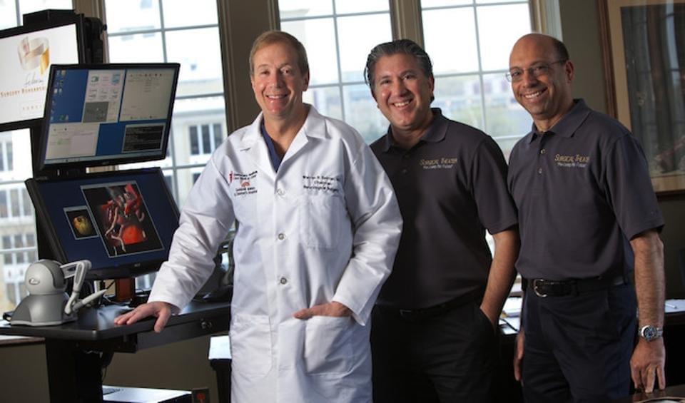 Moty Avisar (center) CEO, President, and Co-Founder, with co-founders Alon Geri (right) VP Engineering, Co-Founder, and Dr. Warren R. Selman, M.D (left) Medical Director. Avisar is former Israeli Air Force R&D Officer who developed large-scale flight sims. He says his work in medical technology is a natural extension of that experience. Moty Avisar (center) CEO, President, and Co-Founder, with co-founders Alon Geri (right) VP Engineering, Co-Founder, and Dr. Warren R. Selman, M.D (left) Medical Director. Avisar is former Israeli Air Force R&D Officer who developed large-scale flight sims. He says his work in medical technology is a natural extension of that experience.