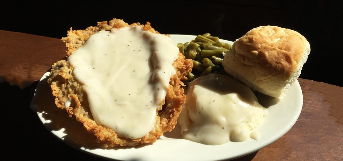 theBarn's Famous Chicken Fried Steak with Mashed Potatoes and Gravy theBarn's Famous Chicken Fried Steak with Mashed Potatoes and Gravy
