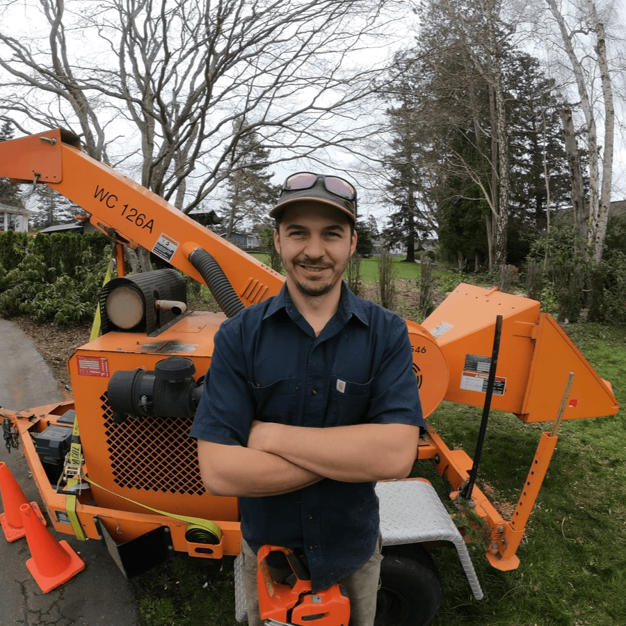Tree service Bellingham photo. Man with Wood Chipper Tree service Bellingham photo. Man with Wood Chipper