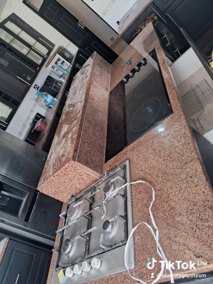 Transform your kitchen with our stunning granite kitchen tops. Available in various colors and finishes, our countertops are not only aesthetically pleasing but also offer exceptional durability and resistance to heat and stains. Granite Kitchen Tops What We Offer It is a company that specialise in creating high quality tombtstones, kitchentops,window sills, vases,fireplace,benches ,tables bathroom and others Transform your kitchen with our stunning granite kitchen tops. Available in various colors and finishes, our countertops are not only aesthetically pleasing but also offer exceptional durability and resistance to heat and stains. Granite Kitchen Tops What We Offer It is a company that specialise in creating high quality tombtstones, kitchentops,window sills, vases,fireplace,benches ,tables bathroom and others