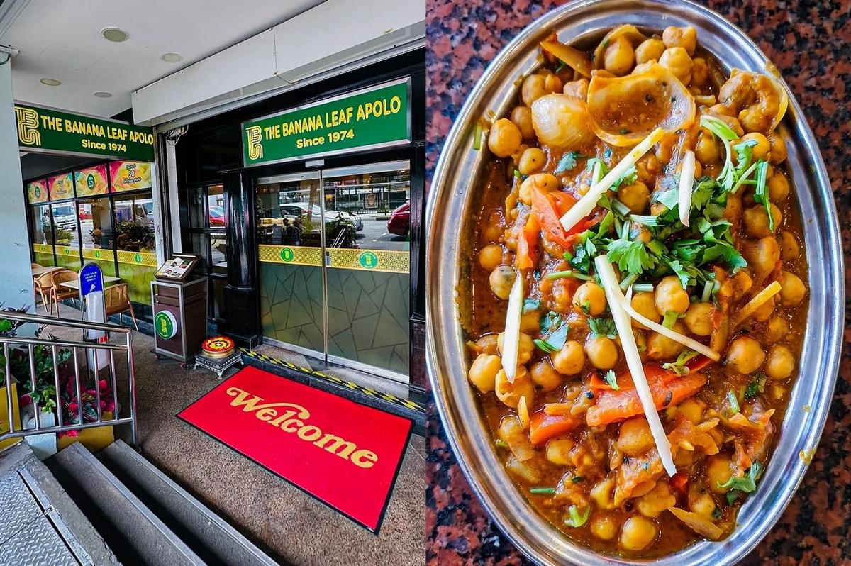 Left: An eye-level, wide-angle shot of the exterior entrance of 'The Banana Leaf Apolo' restaurant, featuring green and yellow corporate signage, sliding glass doors, a bright red welcome mat on the floor, and a short concrete staircase with a steel handrail. Right: A top-down, close-up culinary shot of an Indian chickpea curry (chana masala) served in an oval stainless steel dish, showing cooked chickpeas in a thick, spiced gravy topped with fresh green cilantro leaves, pieces of red tomato, and thin julienned strips of ginger. Left: An eye-level, wide-angle shot of the exterior entrance of 'The Banana Leaf Apolo' restaurant, featuring green and yellow corporate signage, sliding glass doors, a bright red welcome mat on the floor, and a short concrete staircase with a steel handrail. Right: A top-down, close-up culinary shot of an Indian chickpea curry (chana masala) served in an oval stainless steel dish, showing cooked chickpeas in a thick, spiced gravy topped with fresh green cilantro leaves, pieces of red tomato, and thin julienned strips of ginger.