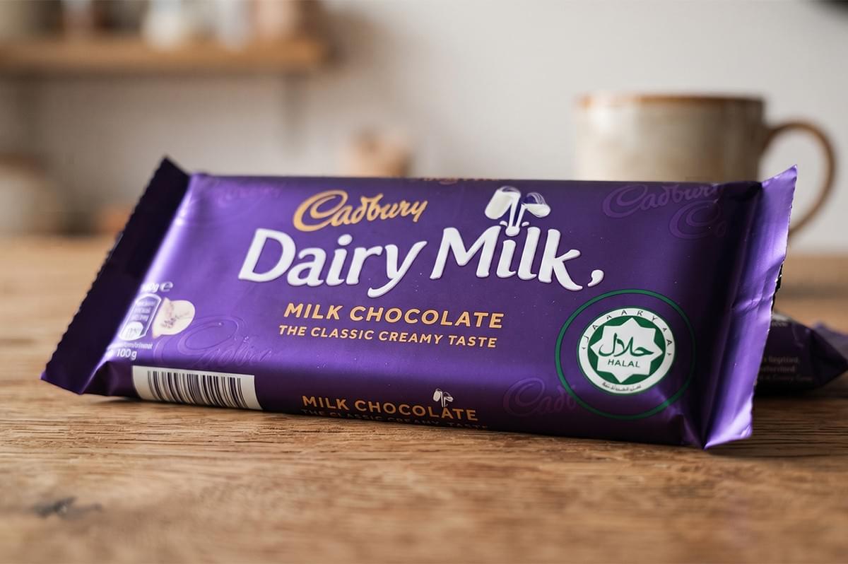 Cadbury Dairy Milk chocolate bar with halal certification logo. Cadbury Dairy Milk chocolate bar with halal certification logo.