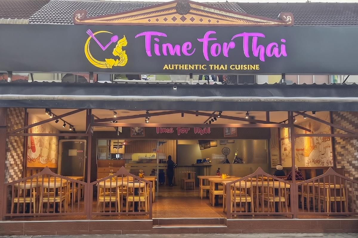 Time For Thai restaurant storefront exterior with authentic halal Thai cuisine signage. Time For Thai restaurant storefront exterior with authentic halal Thai cuisine signage.
