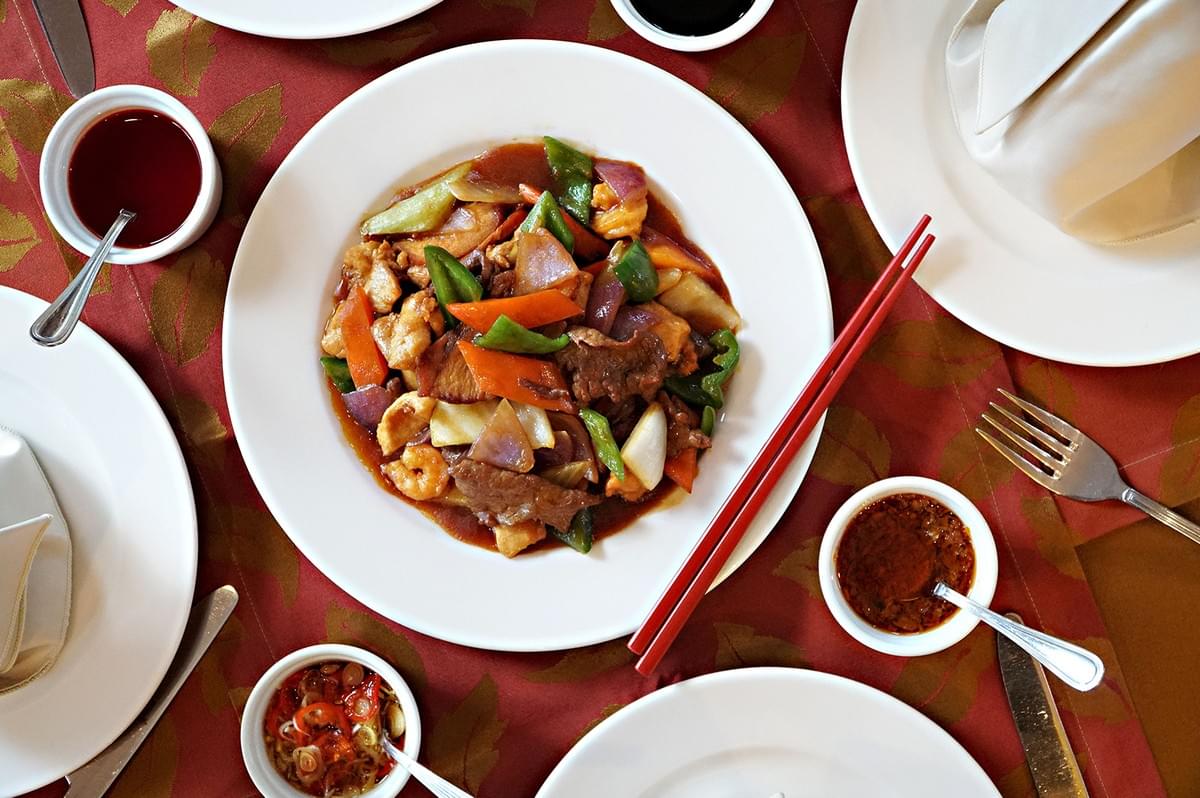 Tasty Wok stir-fry dish served on a table setting near Hougang Mall. Tasty Wok stir-fry dish served on a table setting near Hougang Mall.