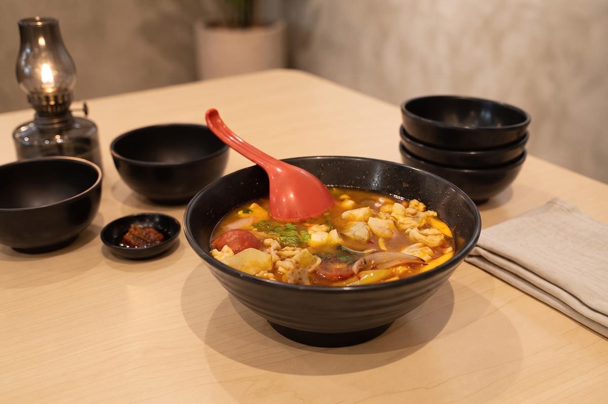 Bowl of authentic Massaman curry or Thai soup served at Time For Thai restaurant. Bowl of authentic Massaman curry or Thai soup served at Time For Thai restaurant.