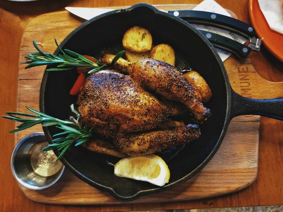 Perfectly grilled chicken with lightly charred skin and juicy meat, highlighting smoky flavours and simple, rustic preparation. Perfectly grilled chicken with lightly charred skin and juicy meat, highlighting smoky flavours and simple, rustic preparation.