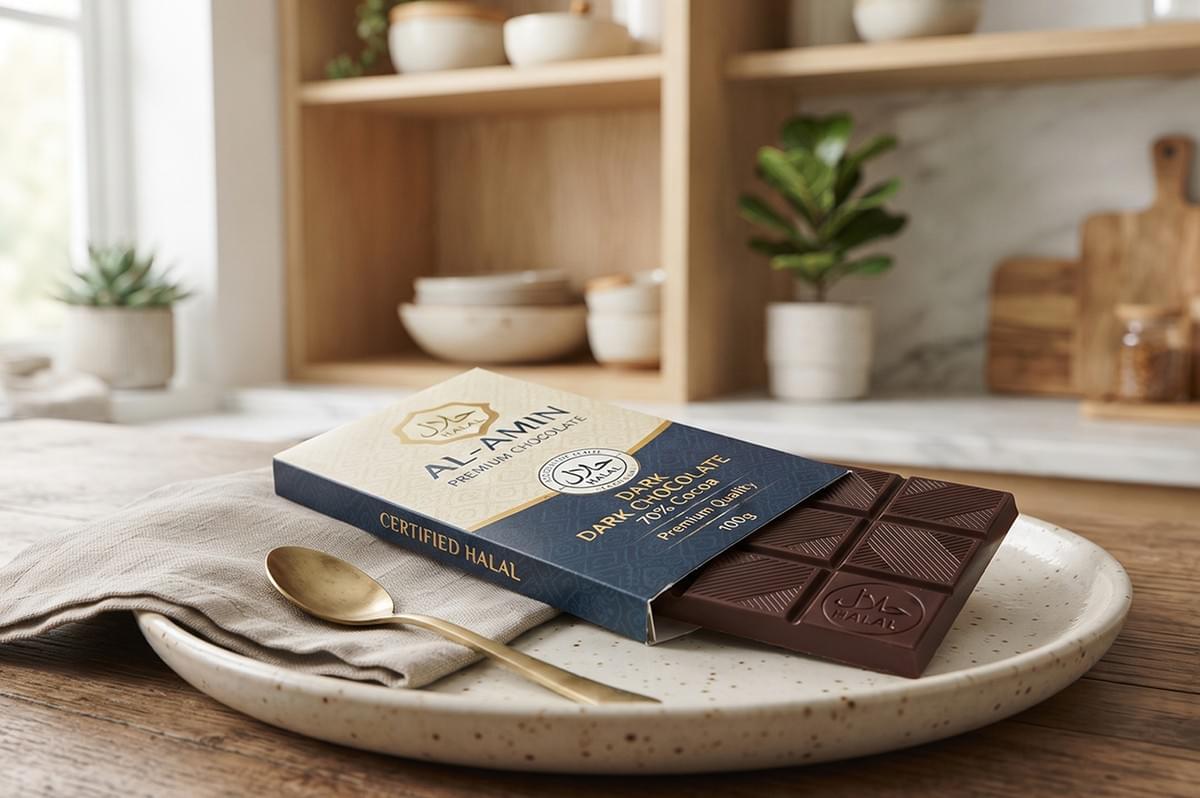 Certified halal dark chocolate bar on a plate in a kitchen. Certified halal dark chocolate bar on a plate in a kitchen.