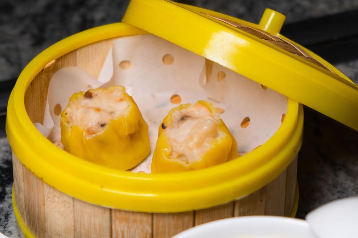 Halal siew mai in a steamer basket at Loong Dim Sum Singapore. Halal siew mai in a steamer basket at Loong Dim Sum Singapore.