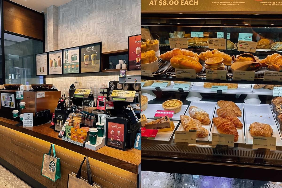 Left: Interior view of a Starbucks counter with a wooden checkout desk, a POS terminal, green Starbucks cups, and promotional signage and menu boards mounted on a textured light-grey tiled wall in the background. Right: A refrigerated display case packed with various pastries, sandwiches, and bakery items on shelves and trays, featuring items like croissants, pies, and cakes with small yellow price tags. Left: Interior view of a Starbucks counter with a wooden checkout desk, a POS terminal, green Starbucks cups, and promotional signage and menu boards mounted on a textured light-grey tiled wall in the background. Right: A refrigerated display case packed with various pastries, sandwiches, and bakery items on shelves and trays, featuring items like croissants, pies, and cakes with small yellow price tags.