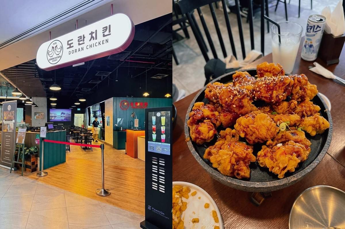 This split-screen image highlights Doran Chicken, showing the restaurant's entrance on the left with a illuminated pink and white sign displaying Korean text alongside "DORAN CHICKEN", dark open-ceiling industrial decor, and a digital ordering kiosk, while the right side features a close-up top-down view of a dark platter heaped with crispy, glazed Korean fried chicken sprinkled with sesame seeds, served on a wooden table alongside drinks and side dishes. This split-screen image highlights Doran Chicken, showing the restaurant's entrance on the left with a illuminated pink and white sign displaying Korean text alongside "DORAN CHICKEN", dark open-ceiling industrial decor, and a digital ordering kiosk, while the right side features a close-up top-down view of a dark platter heaped with crispy, glazed Korean fried chicken sprinkled with sesame seeds, served on a wooden table alongside drinks and side dishes.