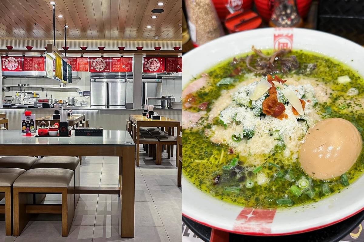 Left: An eye-level, wide-angle interior view of a modern ramen restaurant, displaying wooden dining tables paired with cushioned stools, an open kitchen with stainless steel counter surfaces, red decorative hanging banners, and a light wood-paneled ceiling with recessed lighting. Right: A top-down, close-up shot of a bowl of ramen featuring a creamy white broth swirled with a vibrant green basil or herb pesto oil, topped with finely grated cheese, crispy bacon bits, green scallions, and a whole soft-boiled marinated ramen egg. Left: An eye-level, wide-angle interior view of a modern ramen restaurant, displaying wooden dining tables paired with cushioned stools, an open kitchen with stainless steel counter surfaces, red decorative hanging banners, and a light wood-paneled ceiling with recessed lighting. Right: A top-down, close-up shot of a bowl of ramen featuring a creamy white broth swirled with a vibrant green basil or herb pesto oil, topped with finely grated cheese, crispy bacon bits, green scallions, and a whole soft-boiled marinated ramen egg.