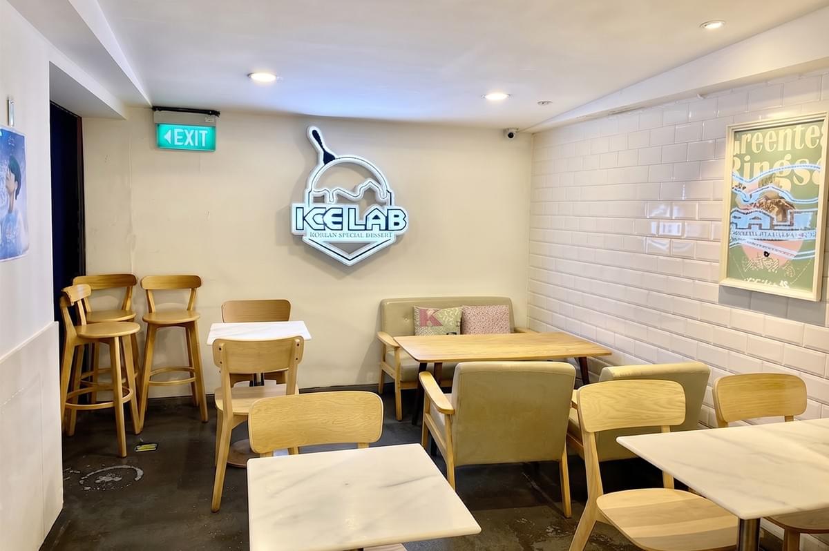Ice Lab Bugis interior showing compact seating and the official logo on the wall. Ice Lab Bugis interior showing compact seating and the official logo on the wall.