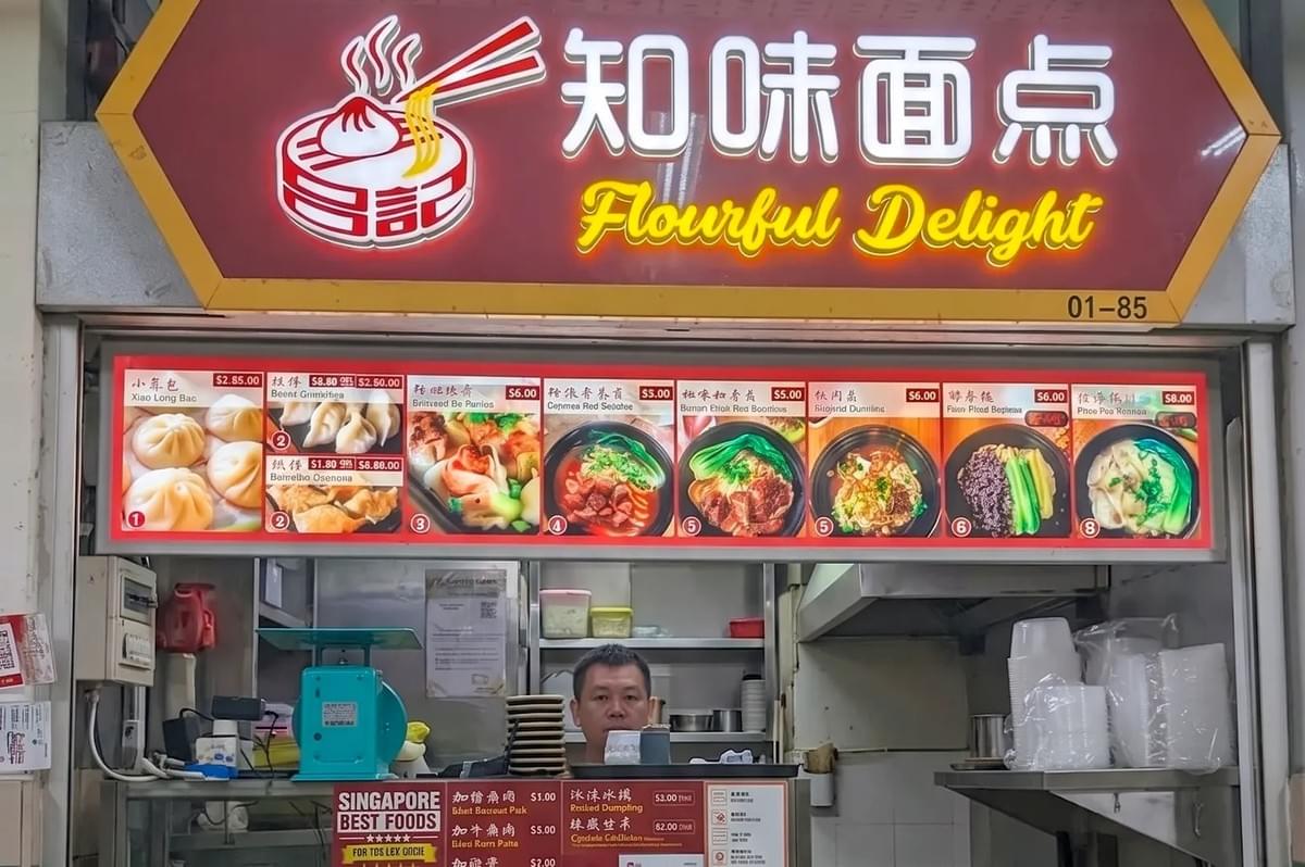 Chinese noodle and dumpling hawker stall named Flourful Delight featuring a menu with Xiao Long Bao and noodle soups. Chinese noodle and dumpling hawker stall named Flourful Delight featuring a menu with Xiao Long Bao and noodle soups.