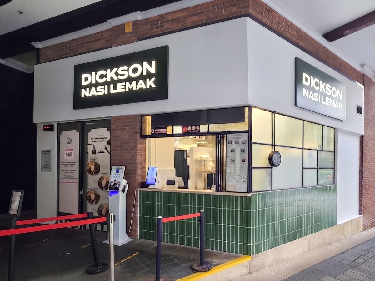 Dickson Nasi Lemak storefront with modern sign and ordering counter. Dickson Nasi Lemak storefront with modern sign and ordering counter.