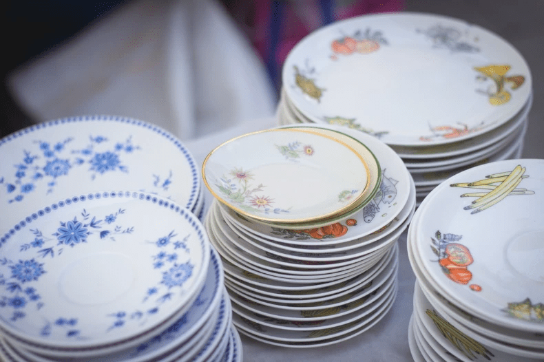 Pile of plates after drip-drying. Pile of plates after drip-drying.