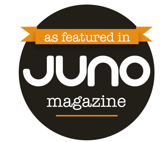 graphic saying 'as featured in Juno magazine' a black circle with white text and orange highlights graphic saying 'as featured in Juno magazine' a black circle with white text and orange highlights