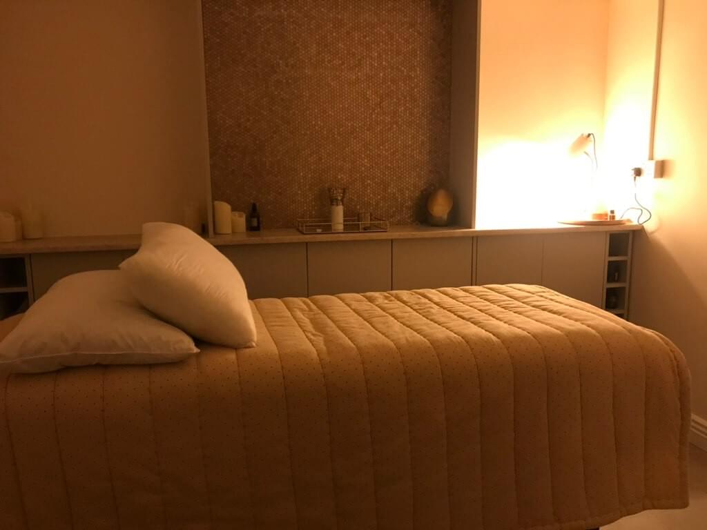 Massage table set up in the cosily lit treatment room in Frome. Massage table set up in the cosily lit treatment room in Frome.