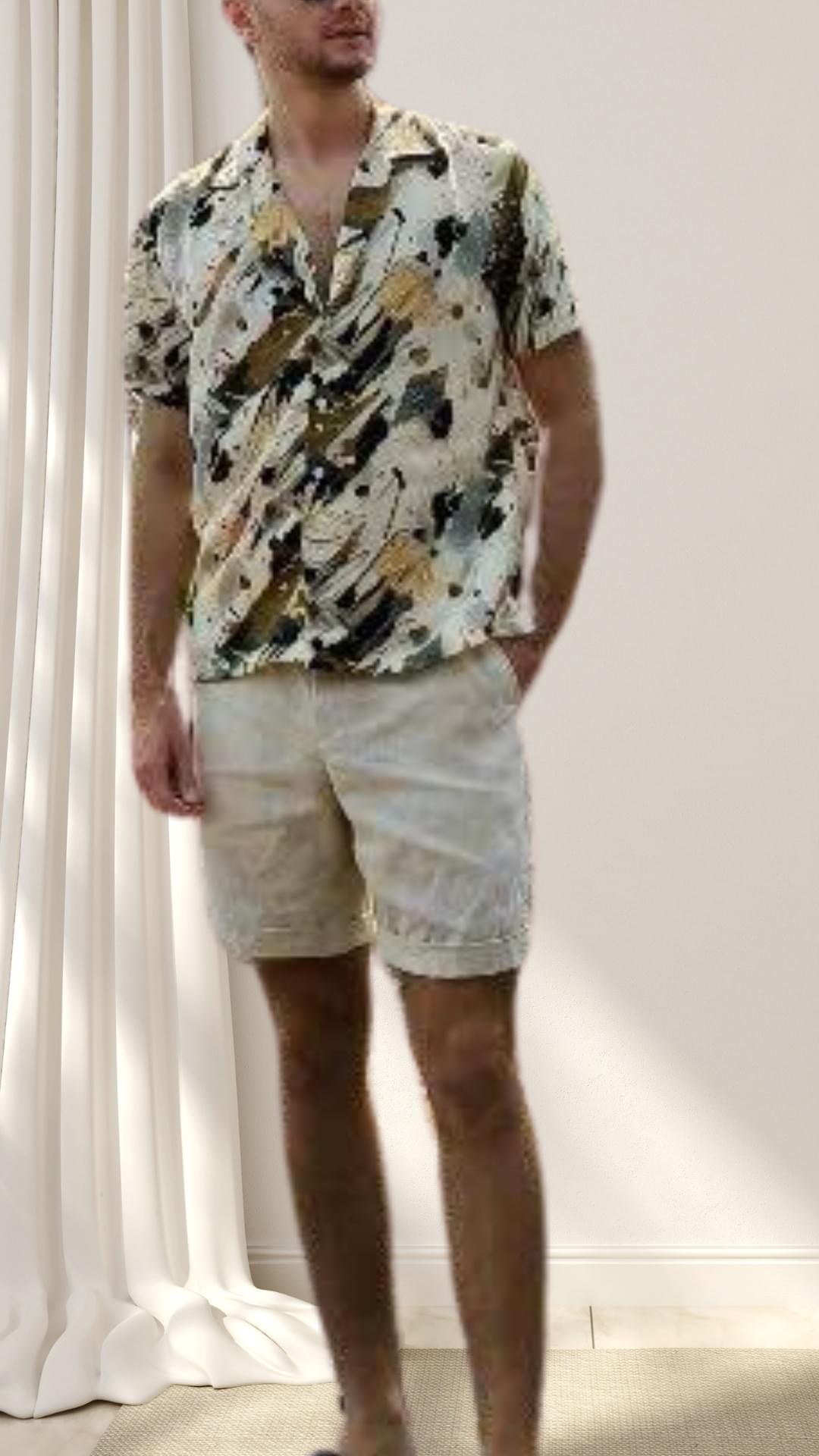Tailored leisure wear of short-sleeved breezy cotton shirt and shorts, signal casual sophistication for this man on vacation. Tailored leisure wear of short-sleeved breezy cotton shirt and shorts, signal casual sophistication for this man on vacation.