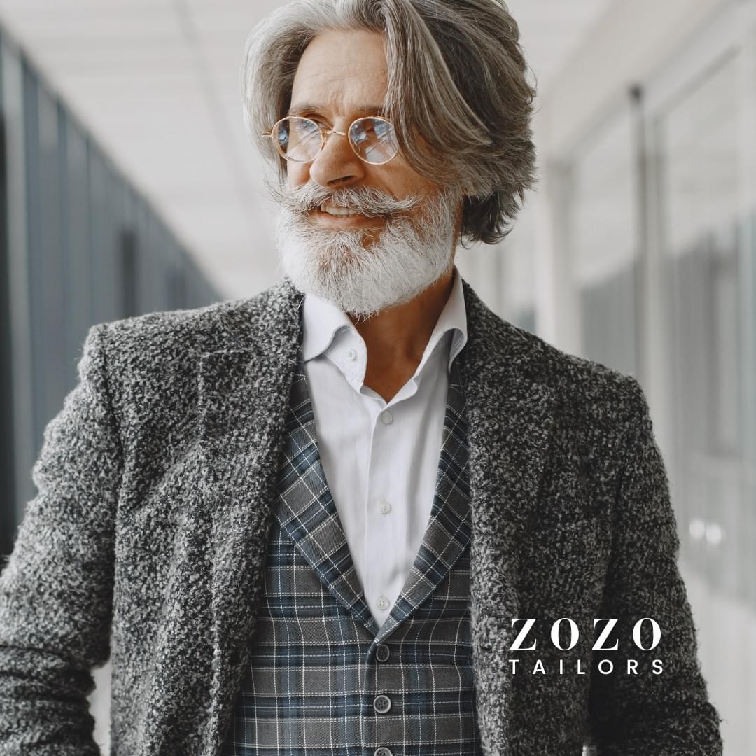 Professional man in a tailored suit and waistcoat — reflecting the personal and professional presence that comes from expert fit and individual style. Professional man in a tailored suit and waistcoat — reflecting the personal and professional presence that comes from expert fit and individual style.