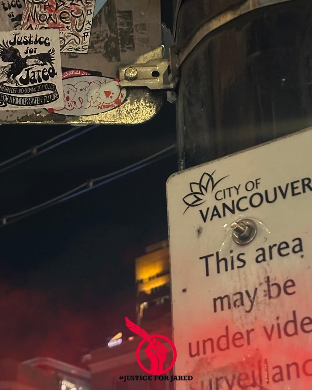 A Justice for Jared sticket on a sign above another sign that says "This area may be under video surveillance." A Justice for Jared sticket on a sign above another sign that says "This area may be under video surveillance."