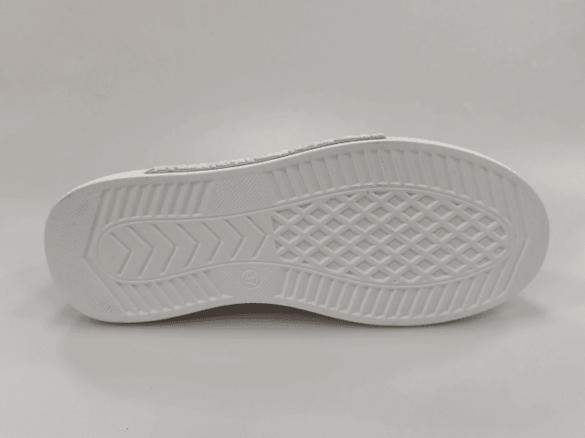 leather shoe sole construction stitching detail closeup leather shoe sole construction stitching detail closeup