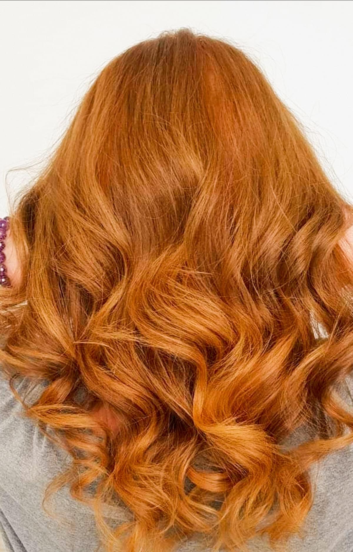Beautifully styled red hair with curls at OMG Hair and Beauty. Beautifully styled red hair with curls at OMG Hair and Beauty.