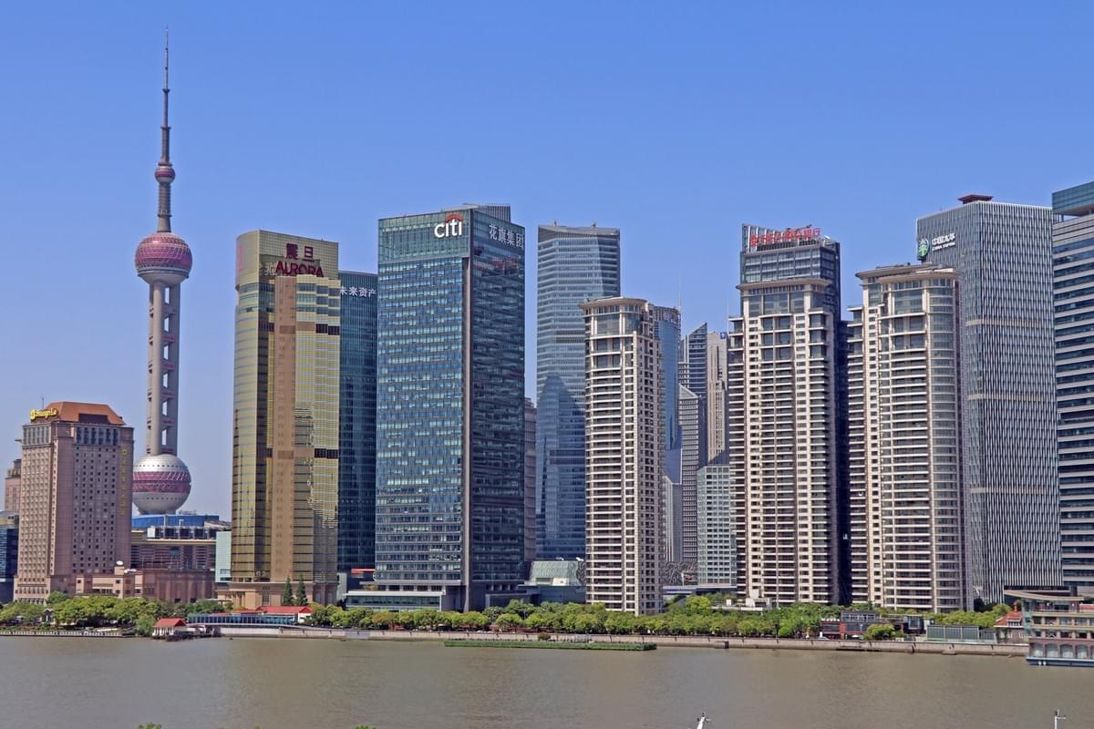 Shanghai Pudong skyline across the Huangpu River — Mussi Katz, CC0. Shanghai Pudong skyline across the Huangpu River — Mussi Katz, CC0.
