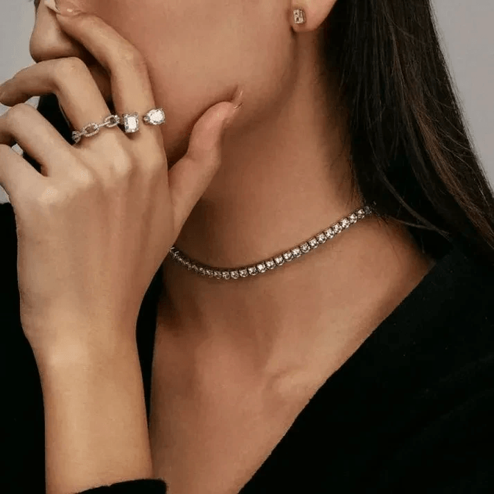 Gold necklace earring set in black jewelry box Gold necklace earring set in black jewelry box