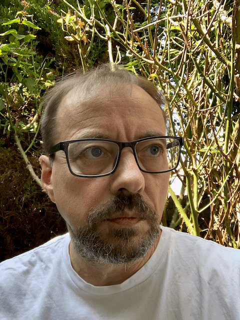 Photo of me with a new haircut - short back & sides. Looking wistfully off into the distance. Photo of me with a new haircut - short back & sides. Looking wistfully off into the distance.
