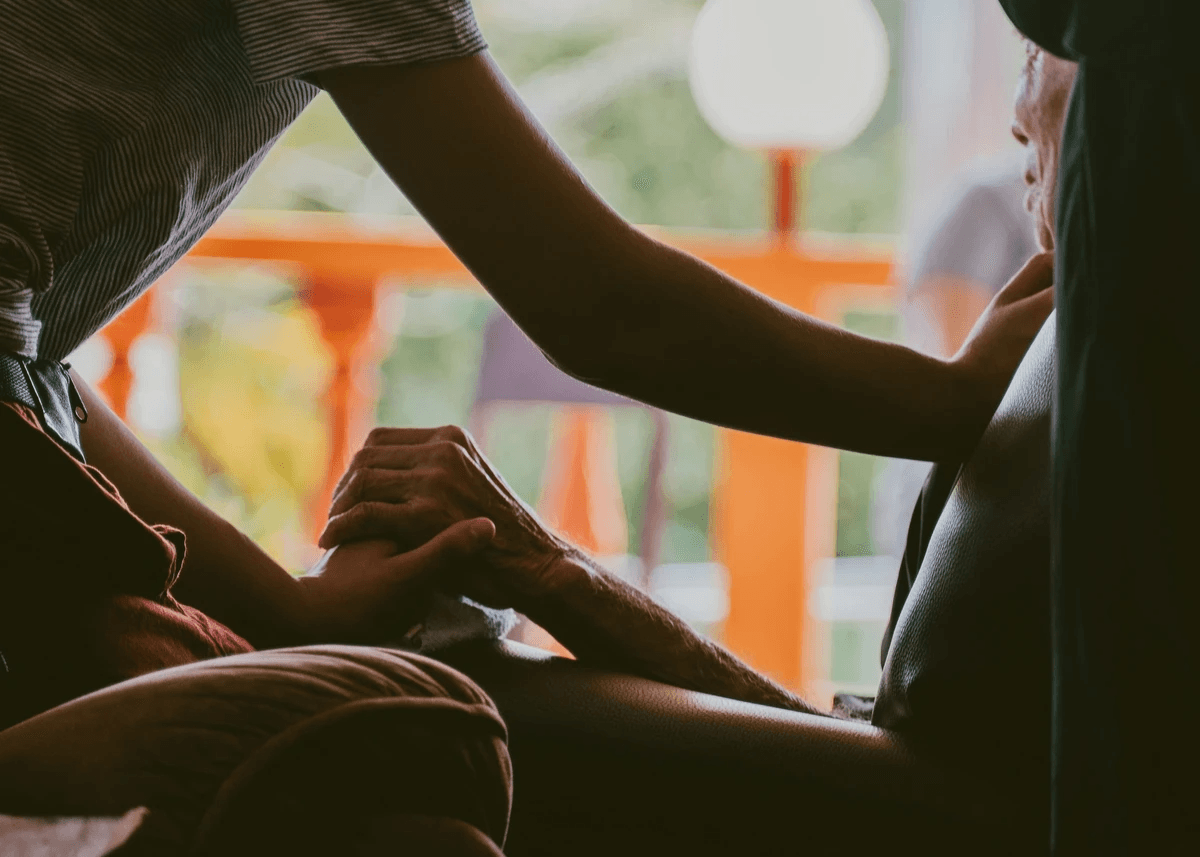 healer holding hand and hard of someone who needs supports healer holding hand and hard of someone who needs supports