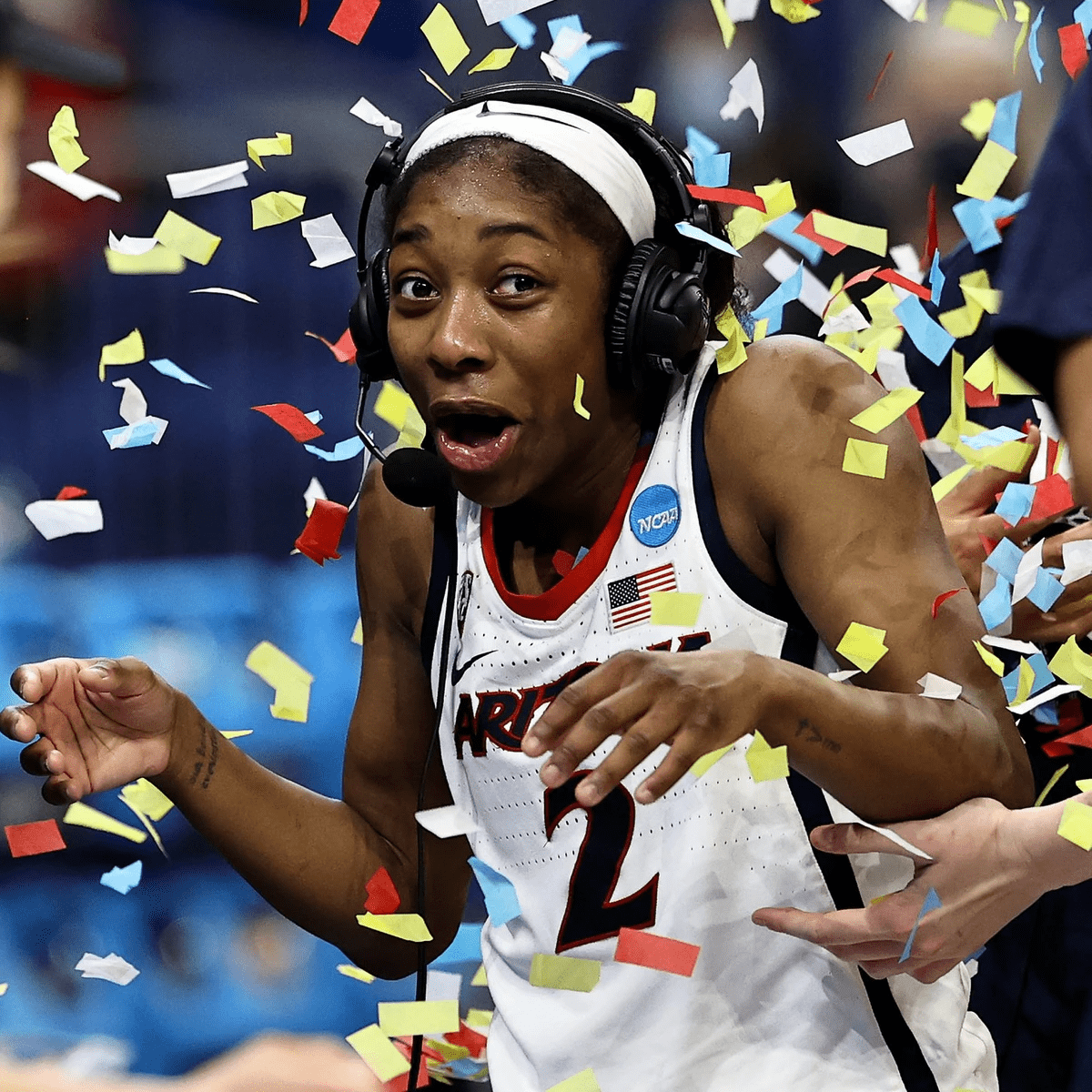 Aari looks happy and surprised as confetti is thrown over her during postgame interview Aari looks happy and surprised as confetti is thrown over her during postgame interview