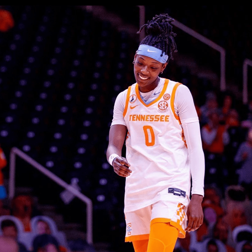 Rennia smiles on the court in Tennessee uniform Rennia smiles on the court in Tennessee uniform