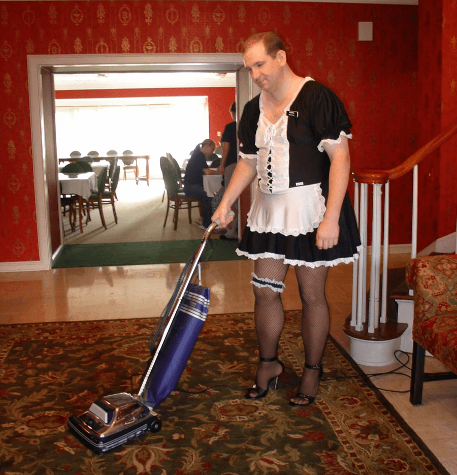 For more than 15 years, Shawn has led a semi-secret second life as a French maid; here he is vacuuming the foyer of the Alpha Chi Omega sorority house on the campus of Ohio State University For more than 15 years, Shawn has led a semi-secret second life as a French maid; here he is vacuuming the foyer of the Alpha Chi Omega sorority house on the campus of Ohio State University