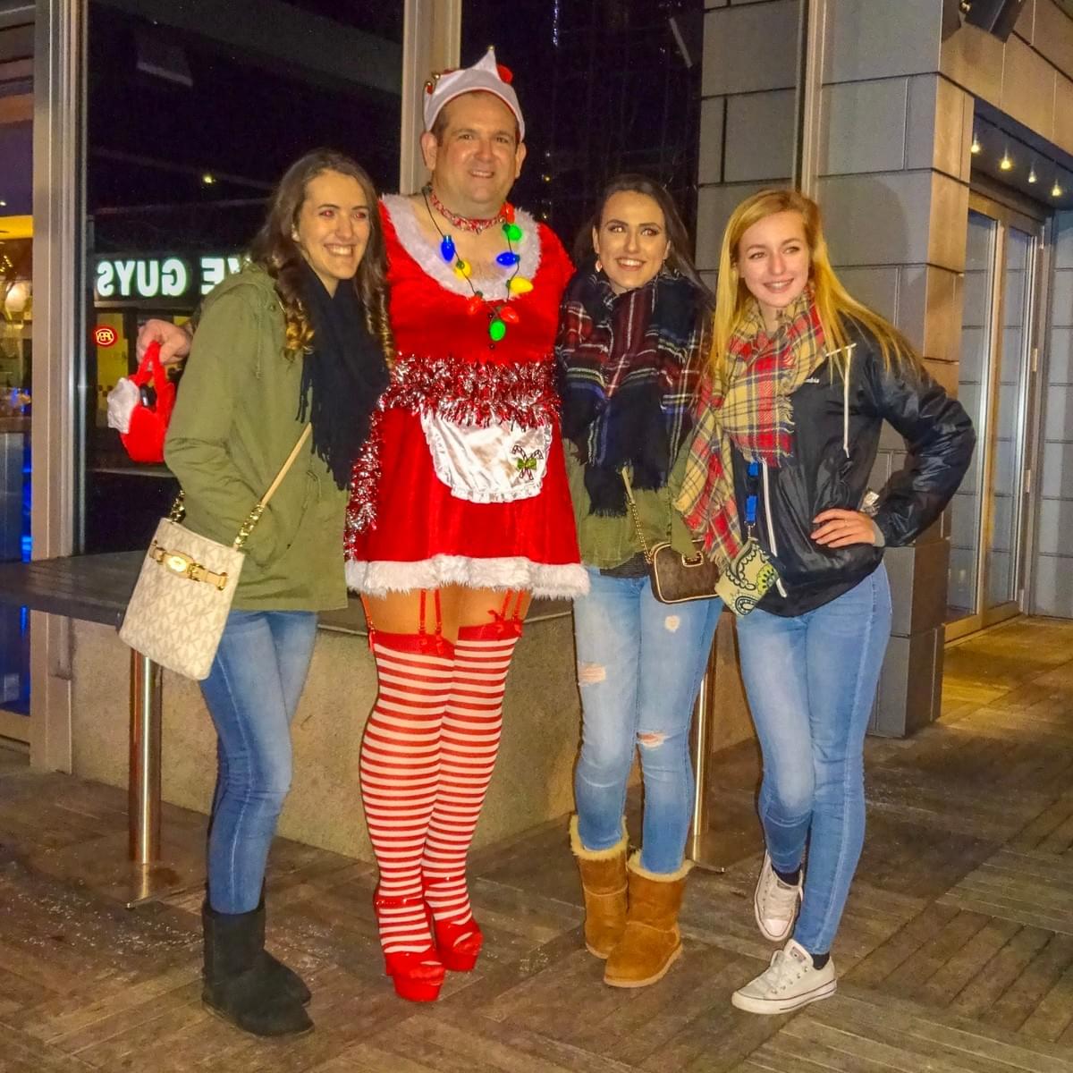 Making friends during one of his Christmastime outings as Santa's Sexy Bitch in downtown Pittsburgh Making friends during one of his Christmastime outings as Santa's Sexy Bitch in downtown Pittsburgh