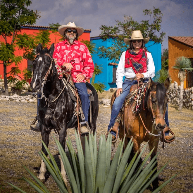 Chris and Jeff Rausten horseback riding at Rancho Baile de la Luna, a horse ranch near san miguel de allende, Mexico Chris and Jeff Rausten horseback riding at Rancho Baile de la Luna, a horse ranch near san miguel de allende, Mexico